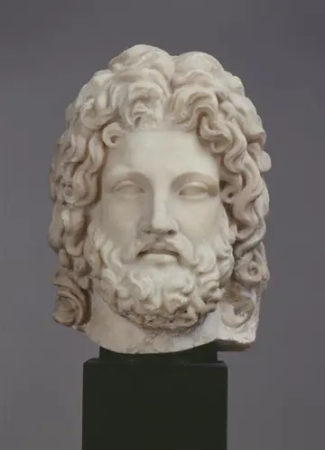 Büste eines Mannes mit mittellangen Haaren und Bart